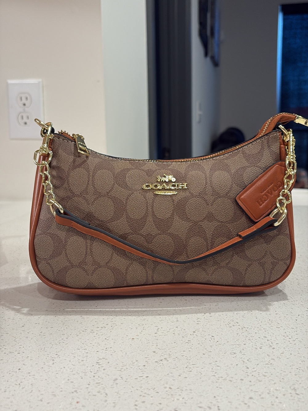Coach Brown Signature Canvas Shoulder Bag with Tan Trim and Gold Hardware